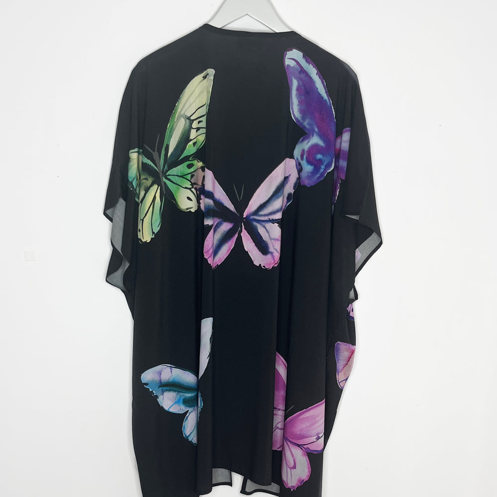 
                      
                        Magical Butterflies Duster
                      
                    